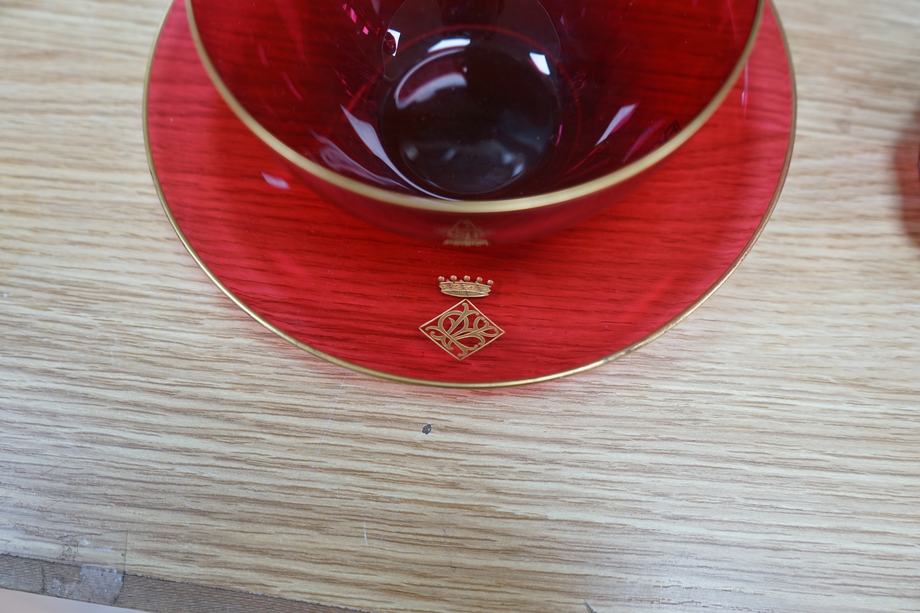 A collection of mixed 19th/20th century coloured glassware, to include a monogrammed cranberry bowl and plate, a flashed glass vase and a small opaque floral vase, largest 34cm high. Condition - fair to good